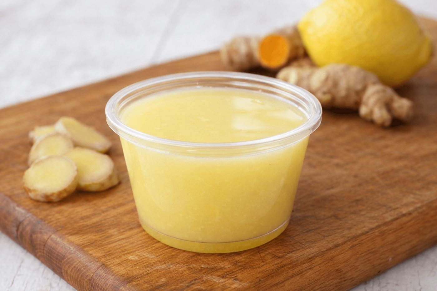 Pure Ginger Shot in a small clear cup